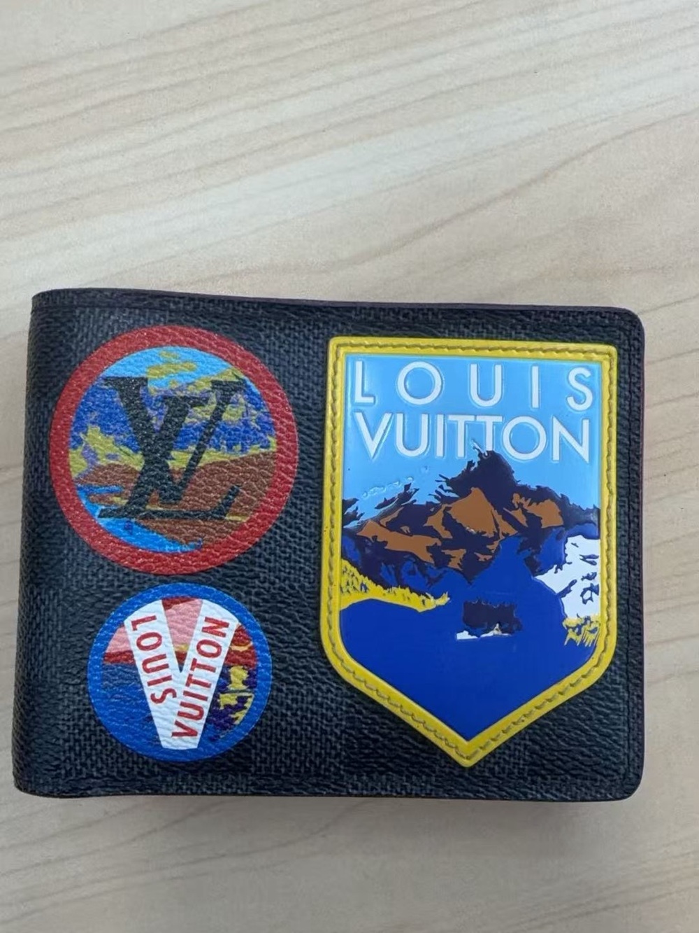 Louis Vuitton Black Leather Patch Graphic Wallet with Blue and Yellow Emblems